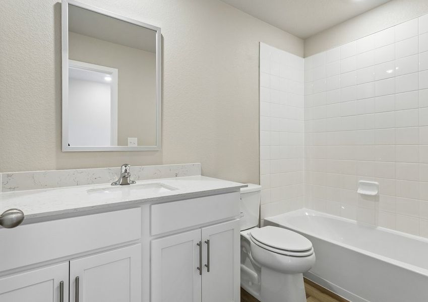 The secondary bathroom has a tub/shower combo.
