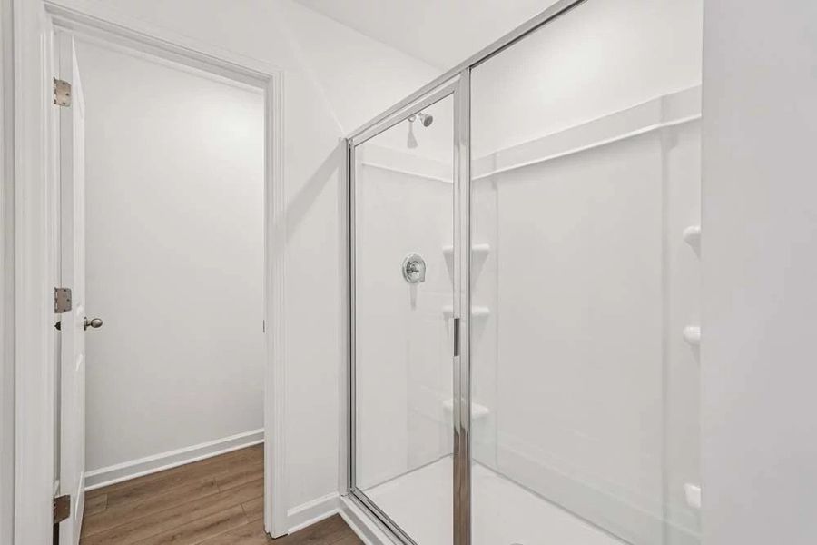 Primary Bathroom Walk-In Shower featuring Artisan Collection Finishes