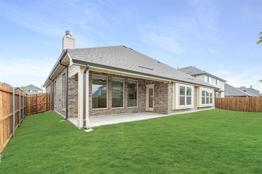 Front exterior of a new home in West Crossing, Anna, TX, highlighting curb appeal (Image 22). Front exterior of a new home in West Crossing, Anna, TX, highlighting curb appeal (Image 22).