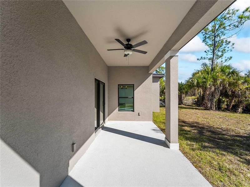 Exterior details and patio area of a home in , North Port (Image 27).