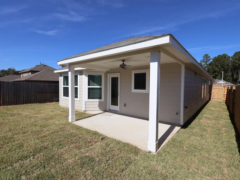 Exterior details and patio area of a home in Pinewood at Grand Texas, New Caney (Image 4). Exterior details and patio area of a home in Pinewood at Grand Texas, New Caney (Image 4).