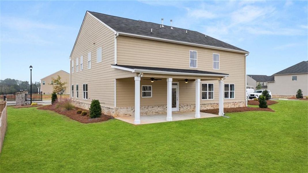 Exterior details and patio area of a home in The Gates at Pates Creek, Hampton (Image 22).