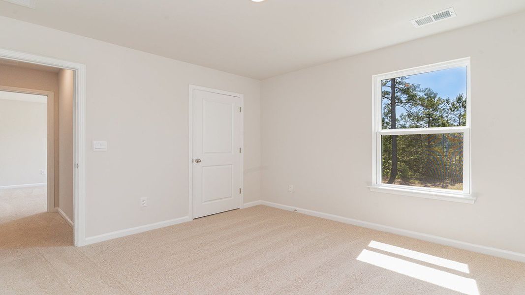Representative unfurnished interior of a home built from the ROBIE by D.R. Horton in Sandridge Park, Little River (Image 28).