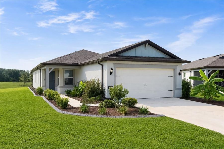 Front exterior of a new home in , Ocala, FL, highlighting curb appeal (Image 25). Front exterior of a new home in , Ocala, FL, highlighting curb appeal (Image 25).