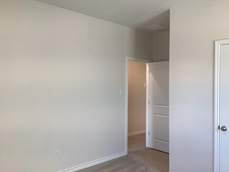 Spacious, unfurnished interior of a new home in The Homestead at Lariat, Liberty Hill (Image 19).