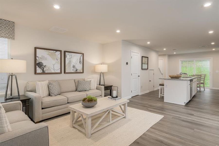 Representative furnished interior of a home built from the Tate by Ryan Homes in Middle Creek Village Coastal Cottages & Villas, Bolivia (Image 12).