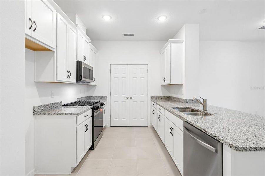 Furnished interior view inside a new home in Eagletail Landings, Howey-in-the-Hills (Image 10).