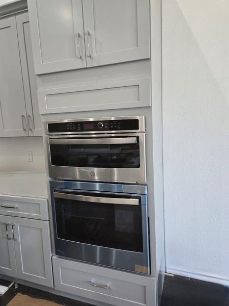 Kitchen view of stainless steel double oven