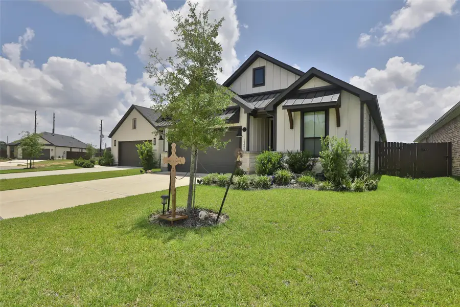 Front exterior of a new home in , Tomball, TX, highlighting curb appeal (Image 2). Front exterior of a new home in , Tomball, TX, highlighting curb appeal (Image 2).