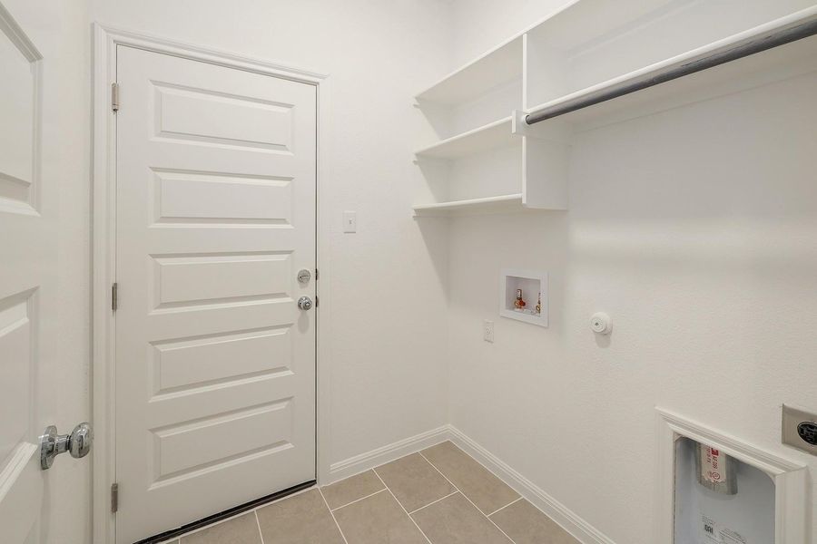 Utility Room in the Ash home plan by Trophy Signature Homes – REPRESENTATIVE PHOTO Utility Room in the Ash home plan by Trophy Signature Homes – REPRESENTATIVE PHOTO