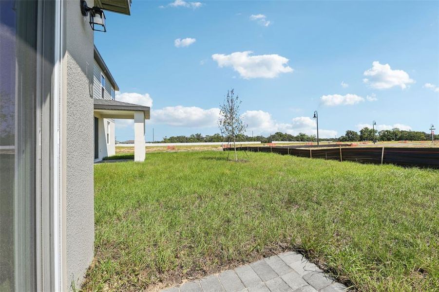 Exterior details and patio area of a home in Crosswinds - Signature Series, Haines City (Image 3).