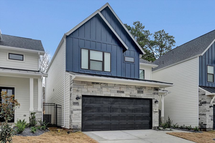 Front exterior of a new home in Summer Place  35', Montgomery, TX, highlighting curb appeal (Image 29).