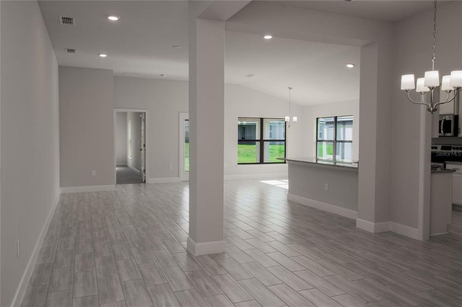 Representative unfurnished interior of a home built from the 1970 by Adams Homes in Winding Oaks, Weeki Wachee (Image 12).