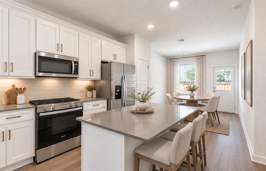 Representative furnished interior of a home built from the Taft by Pulte Homes in Crosswinds, Kyle (Image 10).