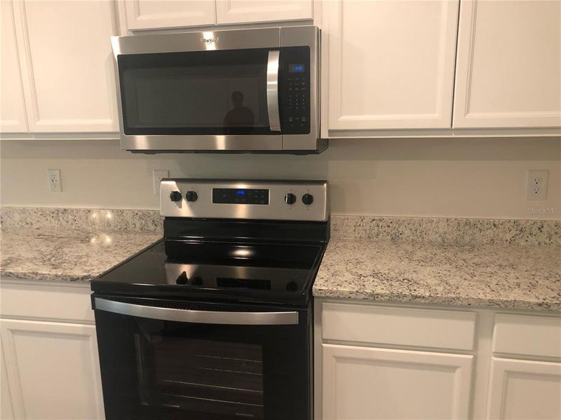 Furnished interior view inside a new home in , Kissimmee (Image 5).