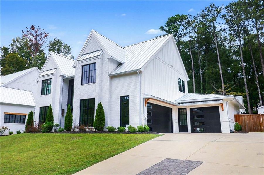 Front exterior of a new home in , Alpharetta, GA, highlighting curb appeal (Image 25).