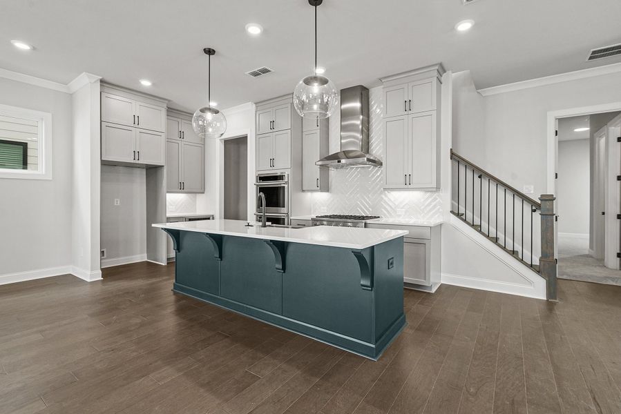 Representative furnished interior of a home built from the The Osbourne by The Providence Group in Waterhaven, Cumming (Image 11).