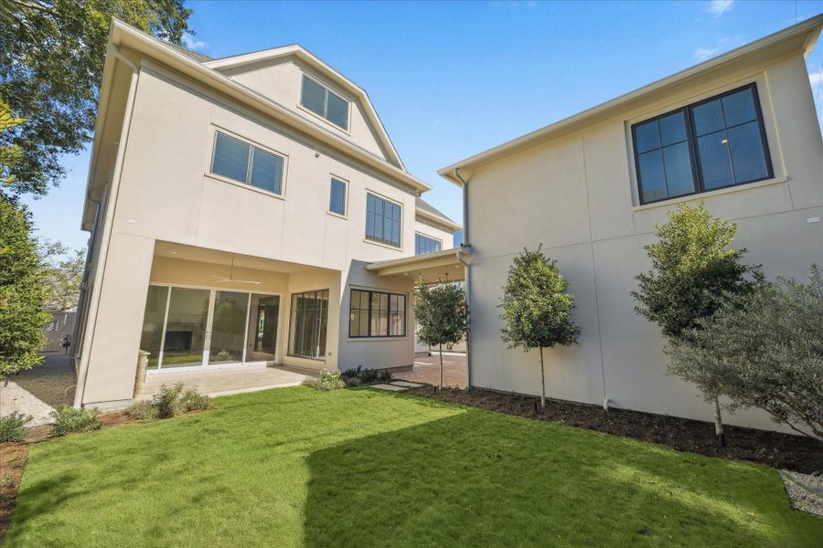 Exterior details and patio area of a home in , Houston (Image 3).