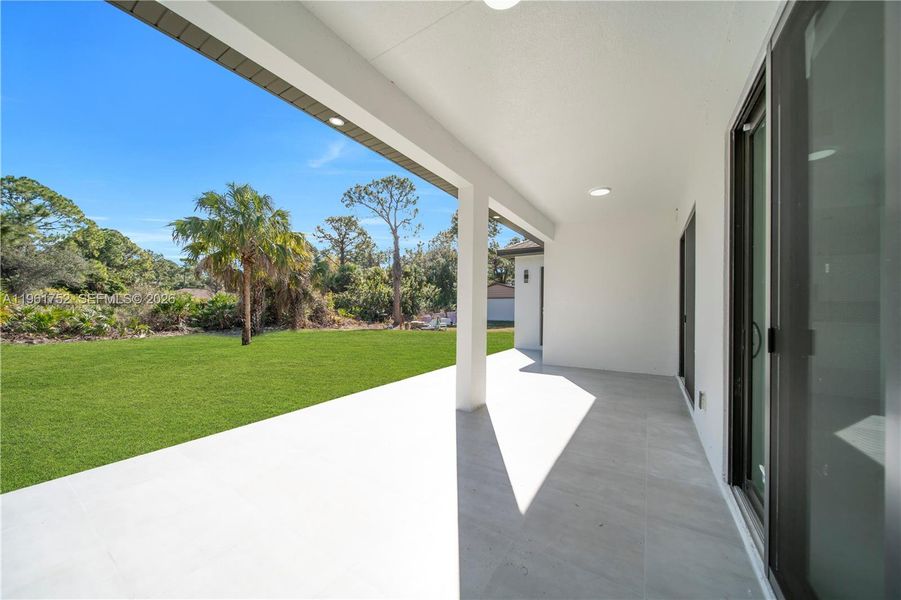 Exterior details and patio area of a home in , Lehigh Acres (Image 3).