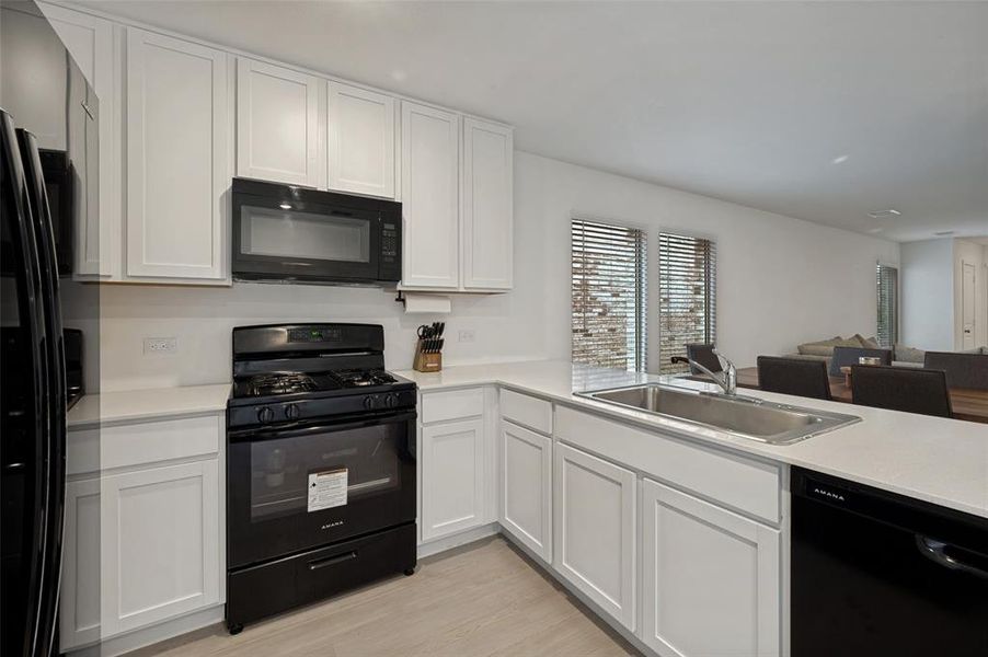 Furnished interior view inside a new home in , Little Elm (Image 18).