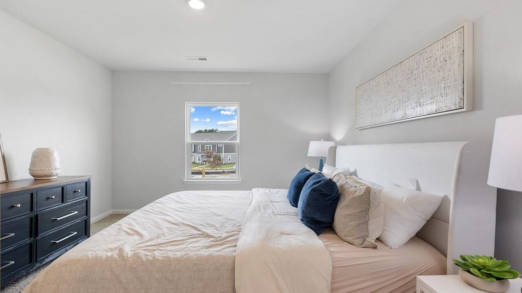 Furnished interior view inside a new home in The Crossing at St. James, Summerville (Image 8).