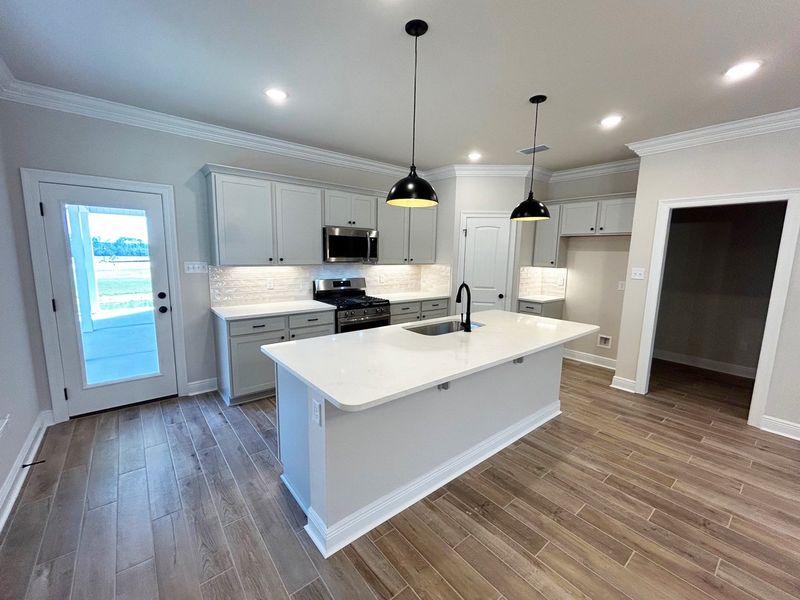 Furnished interior view inside a new home in The Bluffs at Lafayette, Freeport (Image 4). Furnished interior view inside a new home in The Bluffs at Lafayette, Freeport (Image 4).