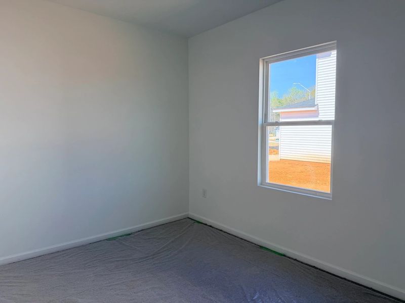 Spacious, unfurnished interior of a new home in Middleton Farms, Middlesex (Image 10).