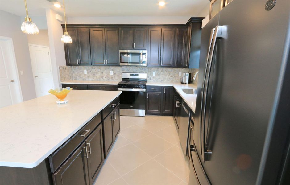 Furnished interior view inside a new home in , Port St. Lucie (Image 32).