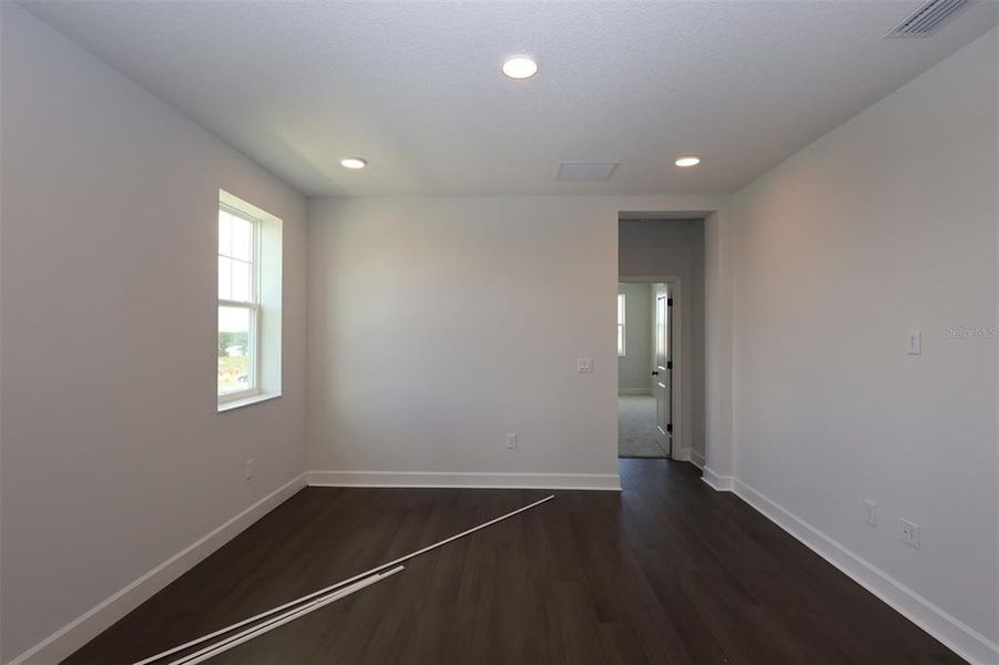 Spacious, unfurnished interior of a new home in Lake Star at Ovation, Winter Garden (Image 20).