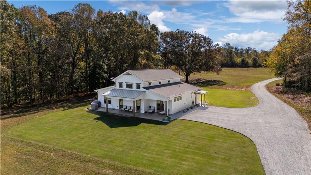 Front exterior of a new home in , Maysville, GA, highlighting curb appeal (Image 22). Front exterior of a new home in , Maysville, GA, highlighting curb appeal (Image 22).
