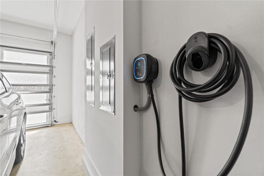 Electric vehicle charger in 2-car garage