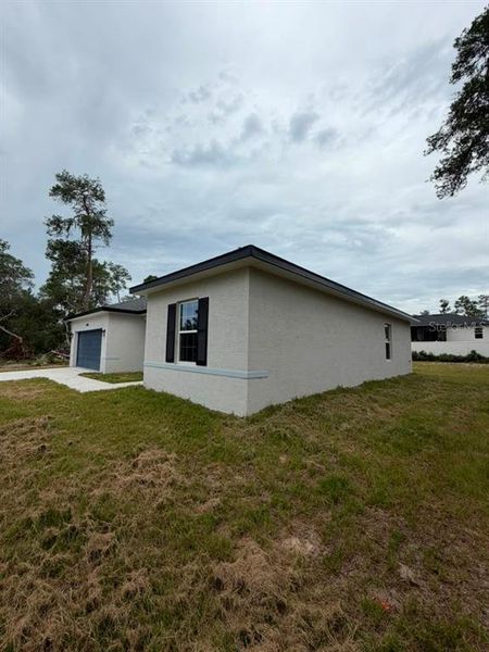 Exterior details and patio area of a home in , Ocala (Image 4). Exterior details and patio area of a home in , Ocala (Image 4).