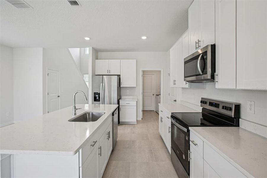 Furnished interior view inside a new home in Two Rivers - Premier Series, Zephyrhills (Image 8).