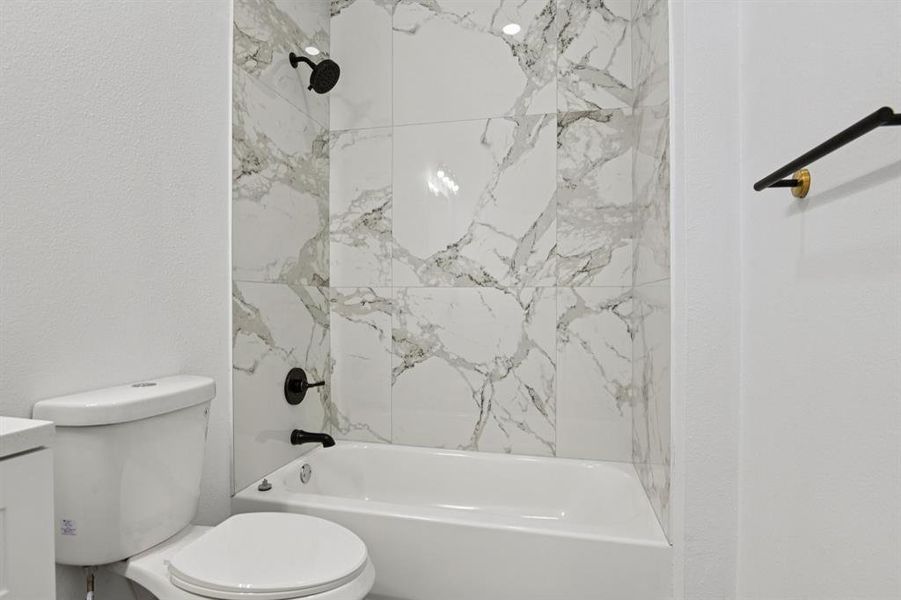 Half bath with vanity and toilet Half bath with vanity and toilet