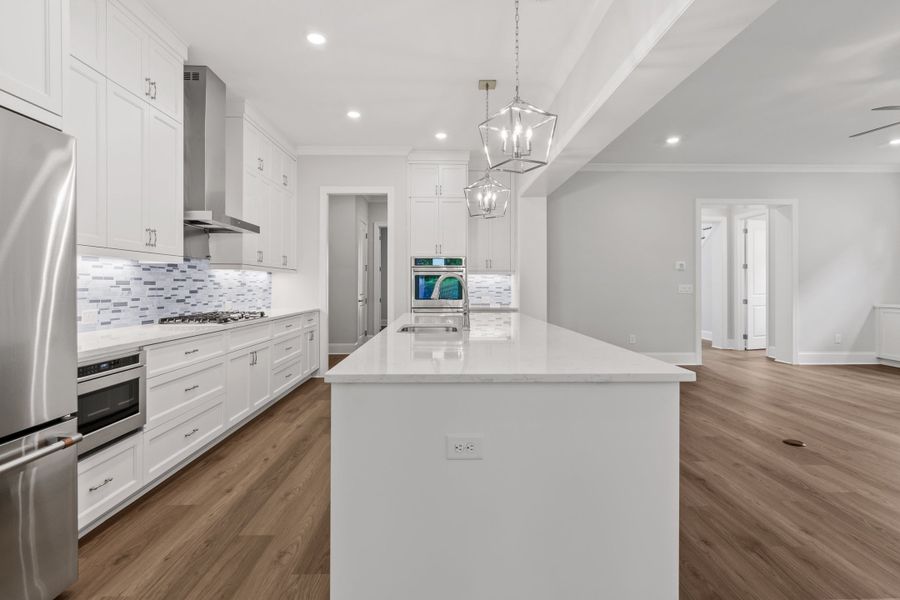Representative furnished interior of a home built from the The Danville by The Providence Group in Bellwyn, Alpharetta (Image 9).