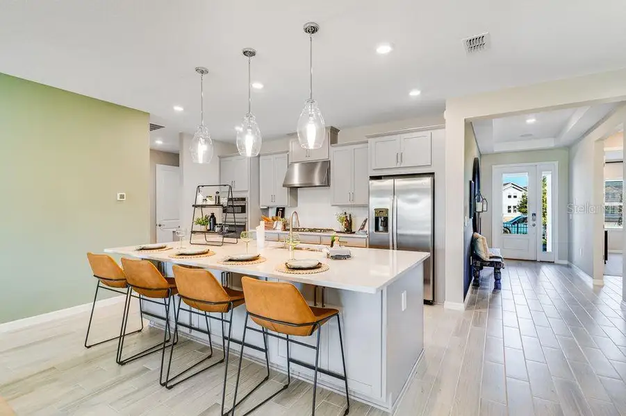 Furnished interior view inside a new home in Coasterra Community Group Page, Palmetto (Image 13).