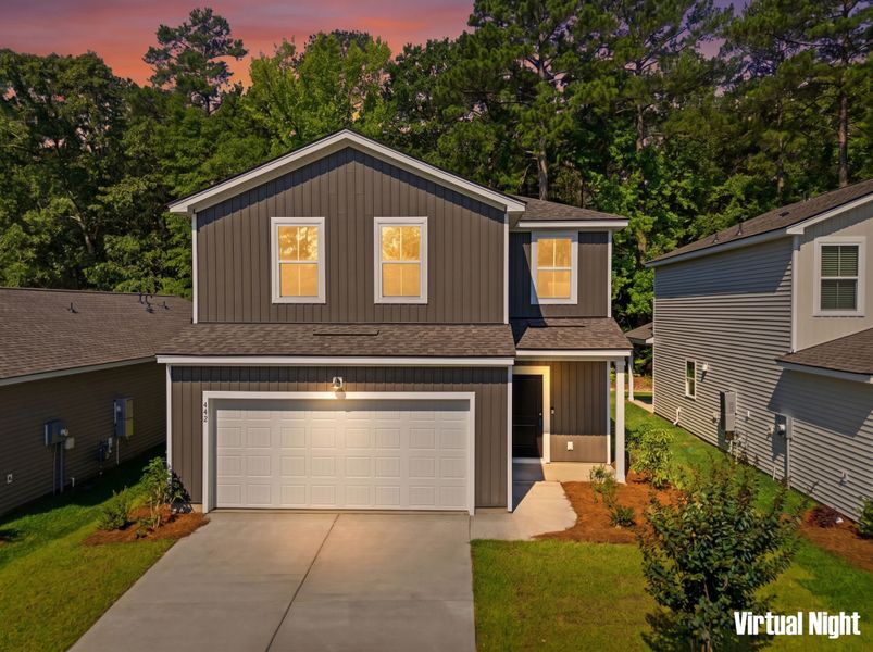 Front exterior of a new home in Grand Arbor, Blythewood, SC, highlighting curb appeal (Image 2). Front exterior of a new home in Grand Arbor, Blythewood, SC, highlighting curb appeal (Image 2).