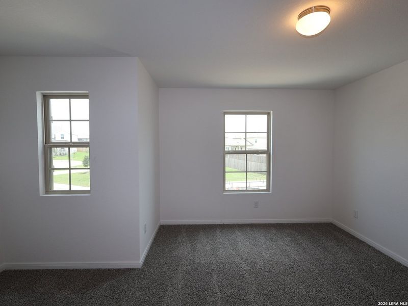 Spacious, unfurnished interior of a new home in Agave, San Antonio (Image 14).