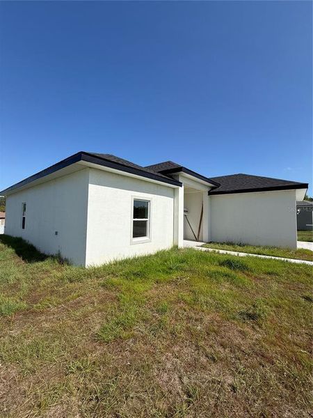 Exterior details and patio area of a home in , Ocala (Image 18).