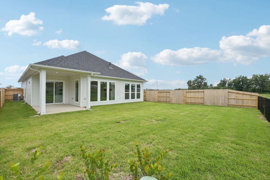 Exterior details and patio area of a home in Winfrey Estates, Tomball (Image 3).