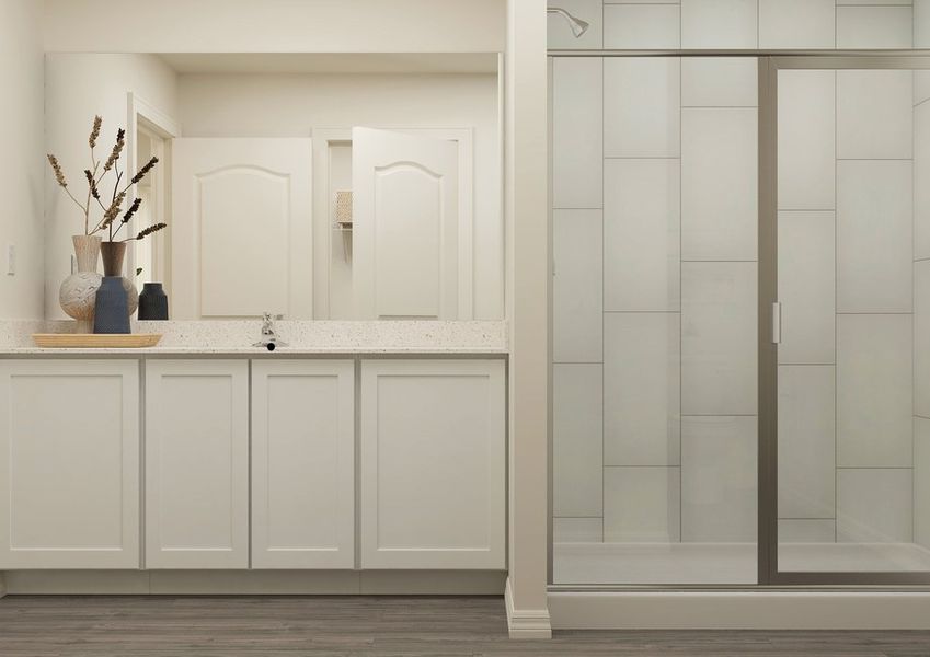 Rendering of a master bathroom showing a single-sink vanity with white cabinetry next to a shower. Rendering of a master bathroom showing a single-sink vanity with white cabinetry next to a shower.