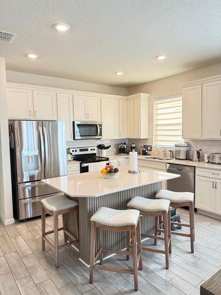 Furnished interior view inside a new home in , Kissimmee (Image 3). Furnished interior view inside a new home in , Kissimmee (Image 3).