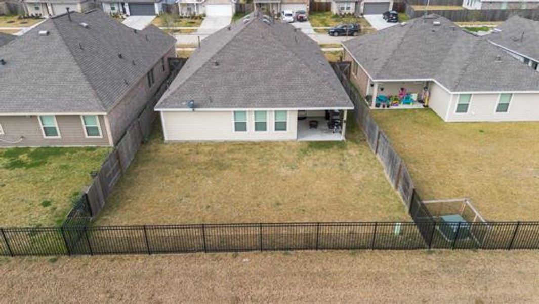 Exterior details and patio area of a home in Sterling Point at Baytown Crossings: Wildflower II Collection, Baytown (Image 17). Exterior details and patio area of a home in Sterling Point at Baytown Crossings: Wildflower II Collection, Baytown (Image 17).