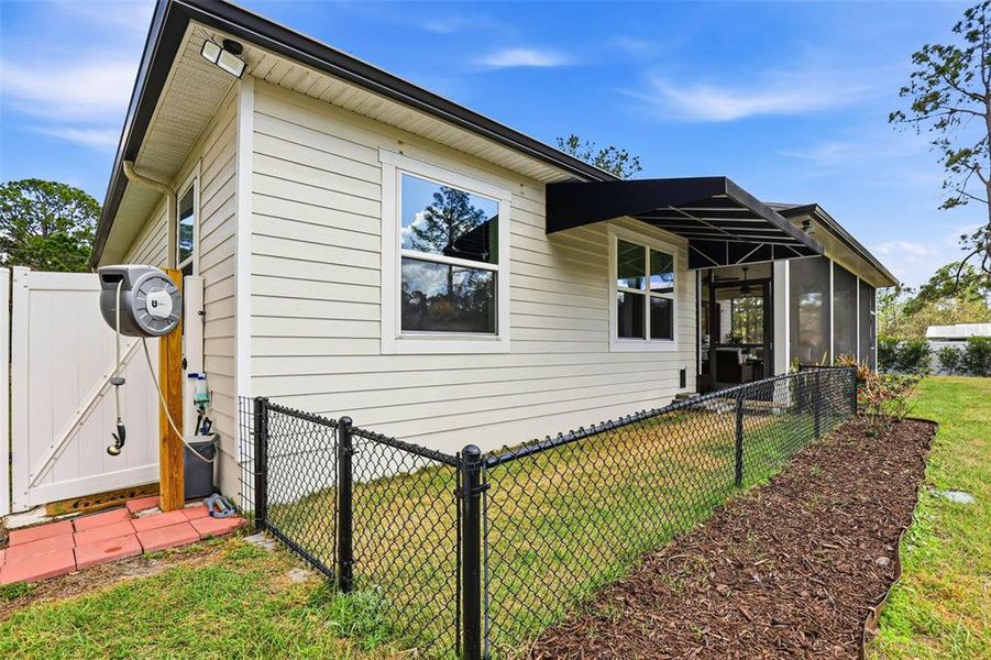 Exterior details and patio area of a home in , Wesley Chapel (Image 23).