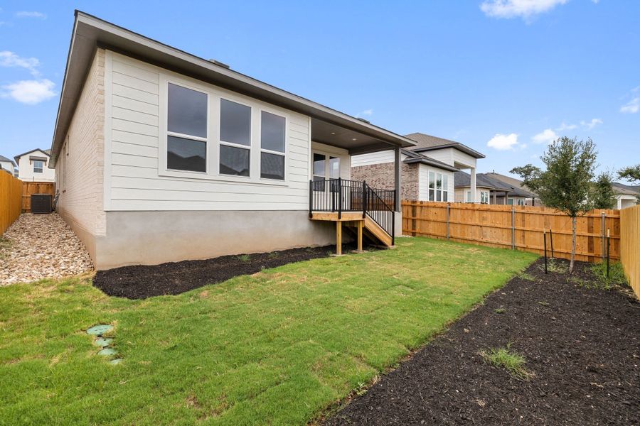 Exterior details and patio area of a home in Heritage, Dripping Springs (Image 27).
