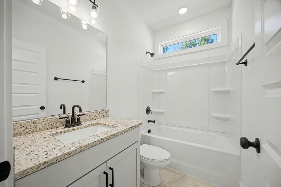 Representative furnished interior of a home built from the Devonshire by Parkside Builders in Givens Park, Chattanooga (Image 11).