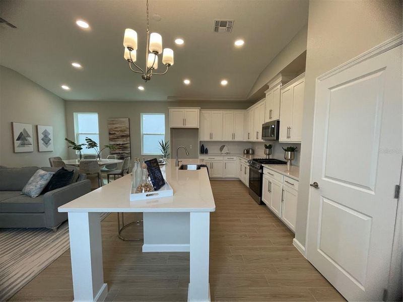 Furnished interior view inside a new home in Center Lake on the Park, St. Cloud (Image 2).