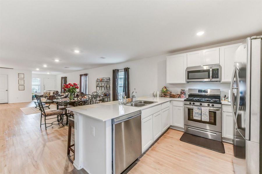 Furnished interior view inside a new home in Burnet Fields at Baytown Crossings, Baytown (Image 11).