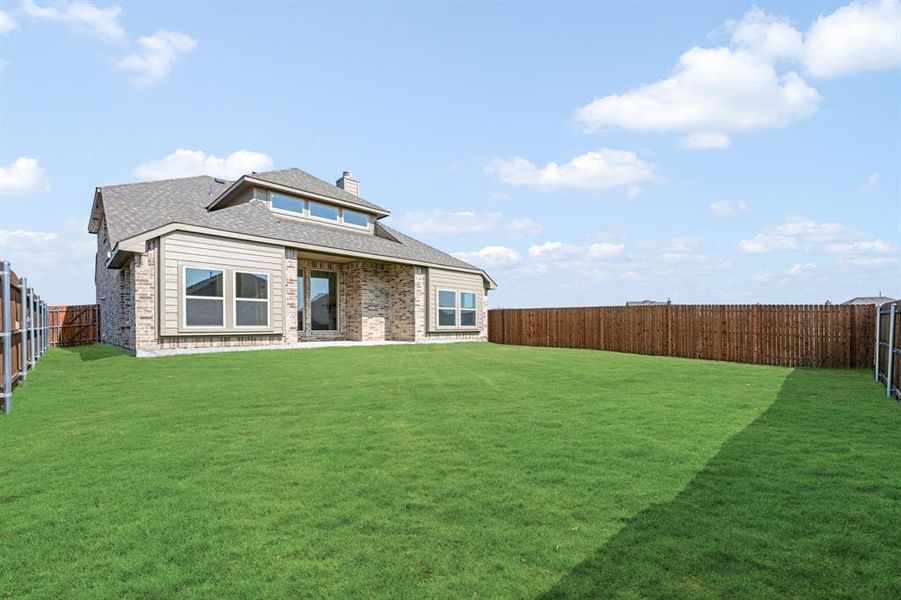 Front exterior of a new home in Star Ranch Classic 50, Godley, TX, highlighting curb appeal (Image 24). Front exterior of a new home in Star Ranch Classic 50, Godley, TX, highlighting curb appeal (Image 24).