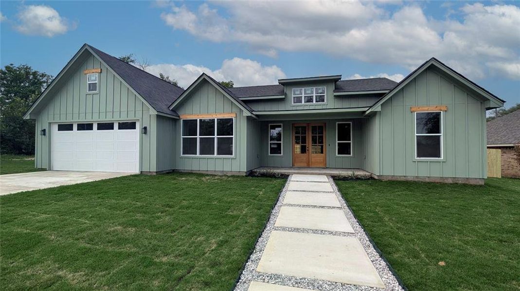 Front exterior of a new home in , Weatherford, TX, highlighting curb appeal (Image 20).